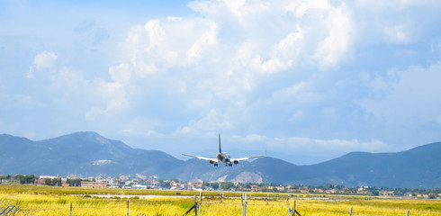 PISA, ITALY - JUN 1: Ryanair airplane lands in the main Tuscany airport, June 1, 2013 in Pisa,...