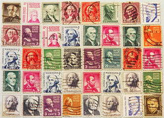 Postage stamps with a various presidents of USA and other politicians.
