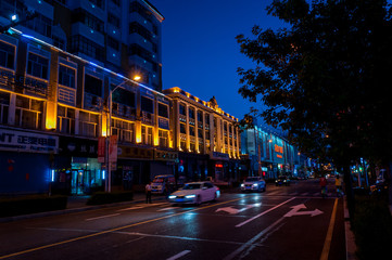 Fototapeta na wymiar China, Heihe, July 2019: Night streets of the Chinese city of Heihe in the summer