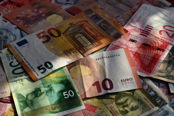 various currencies from countries spanning the World .