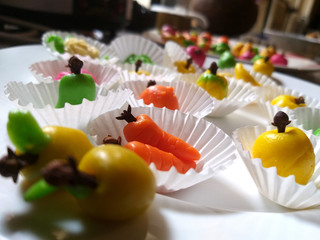 Marzipan sweets with multiple forms of vegetables and fruits for theme parties.