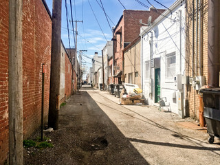 Fototapeta na wymiar Back Alley on a Bright Sunny Day