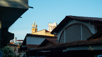 Great Clock Tower in The Sun in The Distance In Puerto Vallarta Mexico