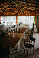  Decorated tables with candles and floral arrangements for celebration