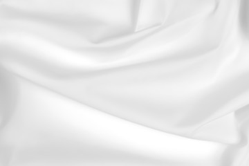 Obraz premium Abstract white fabric texture background. Cloth soft wave. Creases of satin, silk, and cotton. 