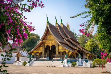 Wat Xieng Thong temple with blue sky, Luang Prabang, Laos - obrazy, fototapety, plakaty