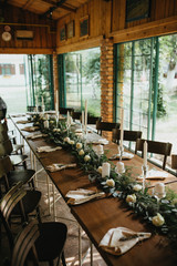  Decorated tables with candles and floral arrangements for celebration
