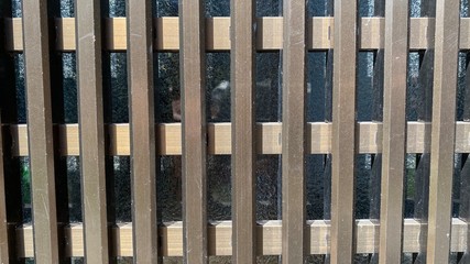 ガラス戸の鉄格子/アルミサッシクローズアップ。テクスチャ/質感/背景画像/バックグラウンドイメージ