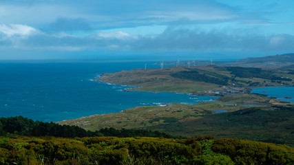 Wind turbines and sea near Bluff New Zealand
