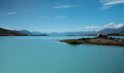 Fototapeta na wymiar Lake Tekapo and mountains in New Zealand