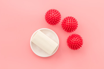 Coronavirus and soap on pink background top-down copy space