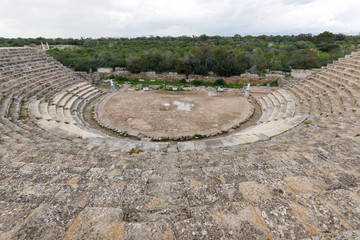 ancient Greek theater, stone steps, beautiful acoustics, traces of ancient civilization in Cyprus in the city of Salamis, similar to others in ancient Greek cities