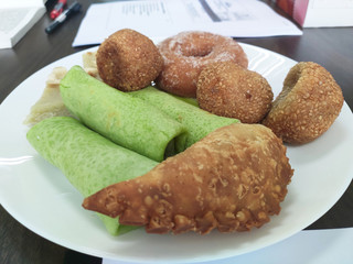 Selective focused on Malaysian traditional cakes are placed in a white plate.