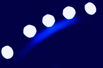 blue and white abstract background with blurry unfocused bokeh light for the template. Natural blue highlights for a design solution.