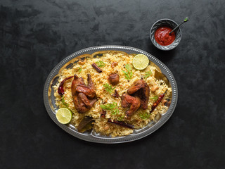 Arabic traditional food bowls Kabsa with meat