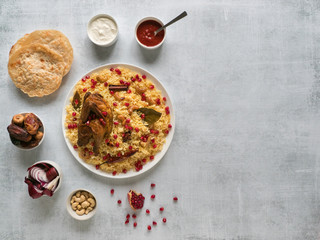Arabic traditional food bowls Kabsa with meat