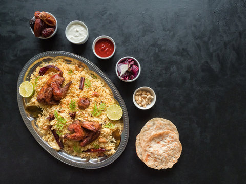 Arabic traditional food bowls Kabsa with meat