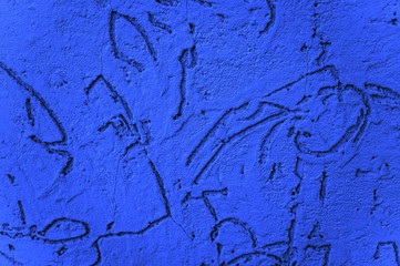 The texture of the foam concrete wall is painted in a classic blue color. The decorative panel. Background for the designer