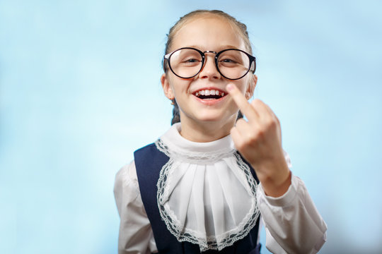 Naughty Schoolgirl Laughing and Showing Middle Finger Portrait