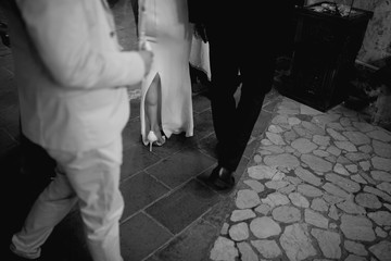  The bride and groom stand at their church wedding