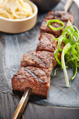 Marbled beef skewer closeup view