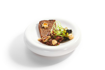 Beef tartare with greenery side view