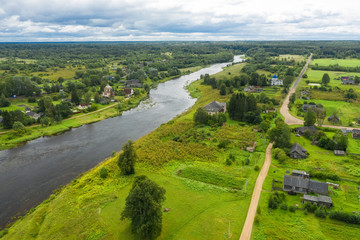Aerial view on the Msta river on a summer rainy day. Borovichi district, Novgorod region, Russia