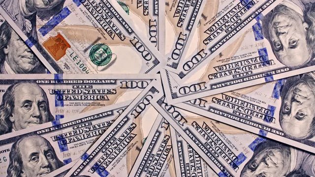 100 usd new notes bills rotating, 4k studio shot