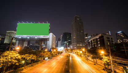 Fototapeta na wymiar Landscape building business district of bangkok. Green screen billboard on road Business district in Bangkok.