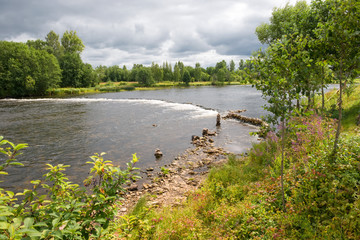 Threshold Staircase to the Msta river on a summer rainy day. Borovichi district, Novgorod region,...