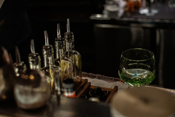 glass of water and bottle of wine on table
