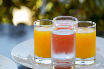 set of refreshing drink. orange juice, guava juice and cold water 