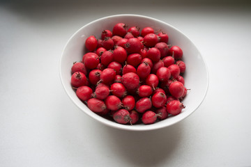 Red cranberries in a plate