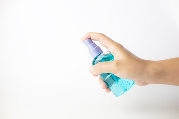 woman using wash hand sanitizer alcohol  standing on white background with copy space ,daily protection from corona virus or COVID-19 concept.