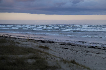Thunderclouds over the white waves of the Gulf of Riga.