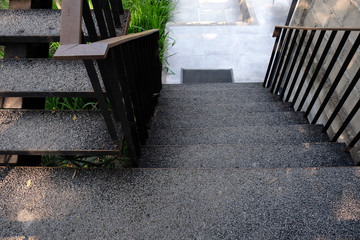 Modern staircase, Staircases in reinforced concrete building, wood railings inside building, New concrete stairs in office building