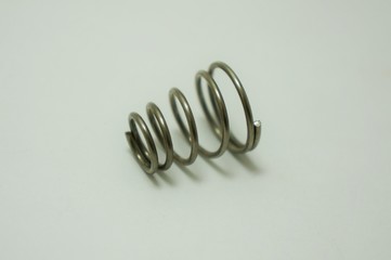 Closeup of Stainless Steel Conical Cone Compression for industry on white background.Taper Pressure...