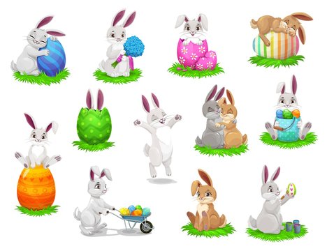 Easter cartoon rabbits with painted eggs isolated vector characters. Bunnies on easter egg hunt, egghunting party, Christian religious spring holiday, rabbit characters play and jump on green grass