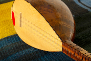 Turkish instrument on the rug. Saz Baglama.