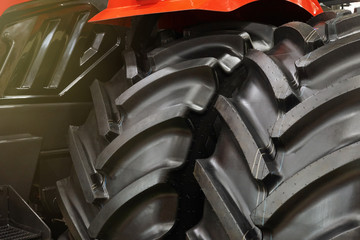 Closeup of big black rubber wheels