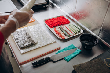 food, sushi, hand, paint, restaurant, color, business, art, fish, white, work, cooking, palette, woman, shop, money, japanese, hands, design