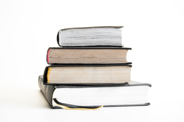 A stack of books. Old books. On white background.
