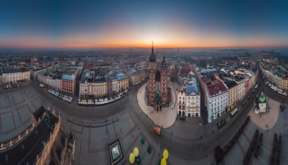Fototapeta premium Aerial view of the Market Square in Cracow in sunrise time