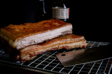 Oriental Roast Pork Belly on wooden chopping board