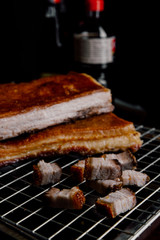 Oriental Roast Pork Belly on wooden chopping board