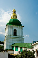 Small tower with a dome and a window against the sky