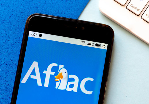 In this photo illustration Aflac Inc. logo is seen displayed on a smartphone