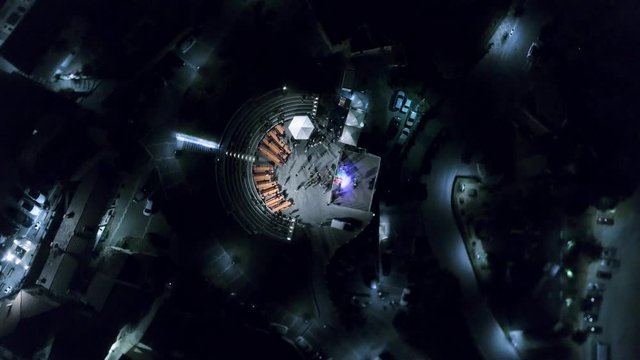 Italian Party in a Remote Village - People Dancing at Night - Drone shot from above ending in closeup