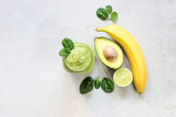 Smoothies with banana, avocado, spinach, lime