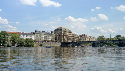 View of the National Theater in Prague on the shore of the Vltava